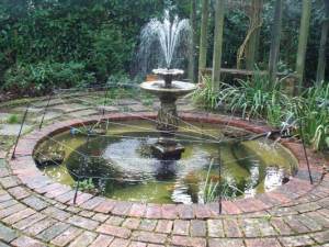 A Heron Guard Fitted To A Pond With A Hard Surround
